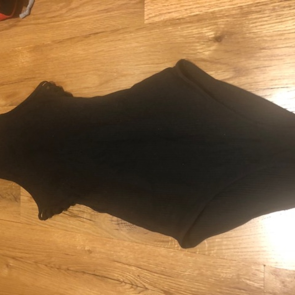 Black ribbed bodysuit with side slits